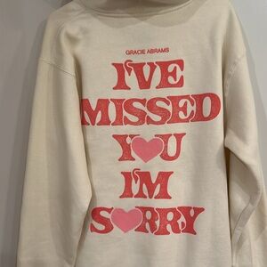 Gracie Abrams Cream Hoodie with Pink Graphic Text